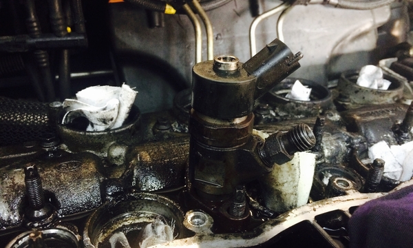 Number 2 injector is seized in with corrosion. 
This is before we stated the strip down procedure.